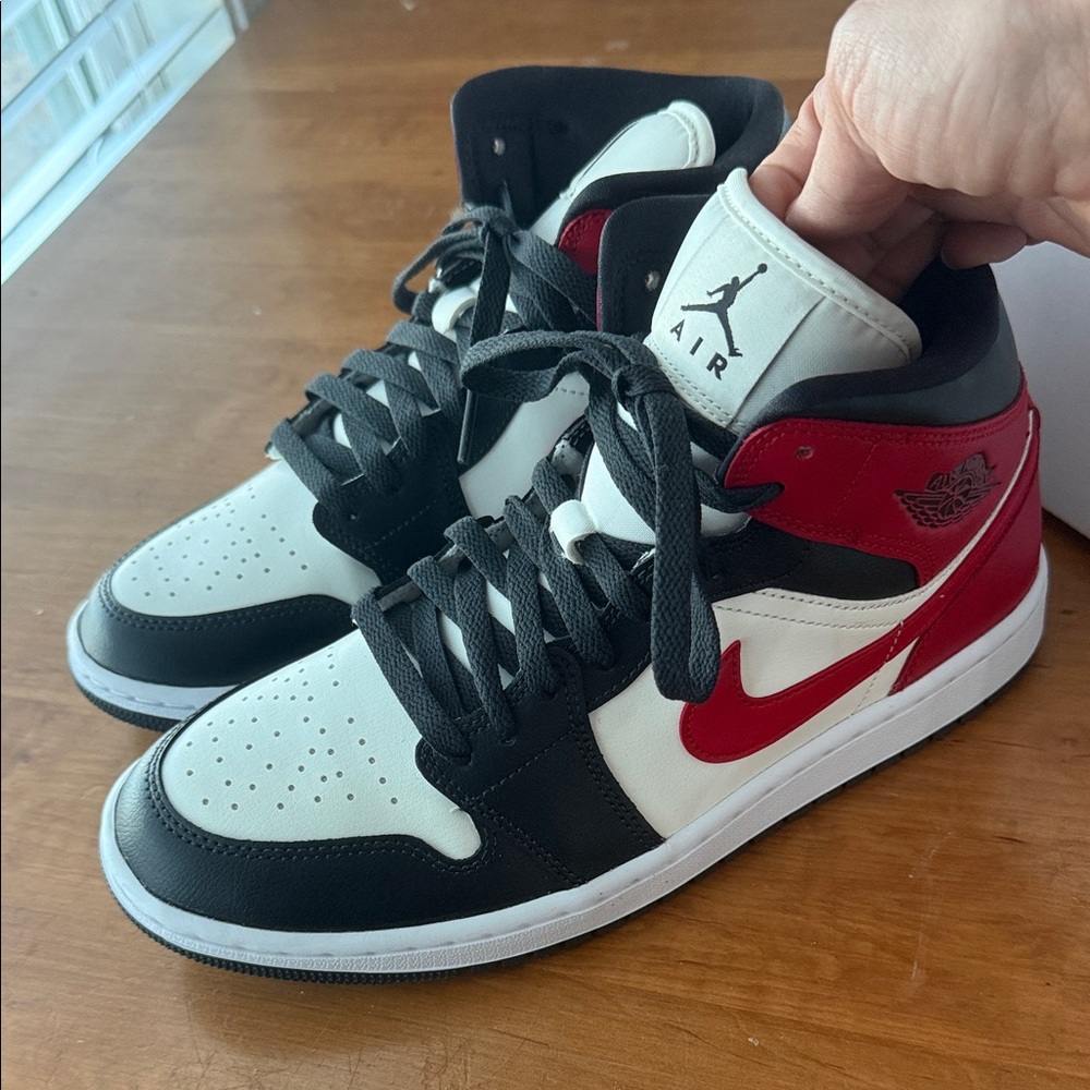 Nike Black, Red, and White Air Jordan 1 Mid Sneakers
